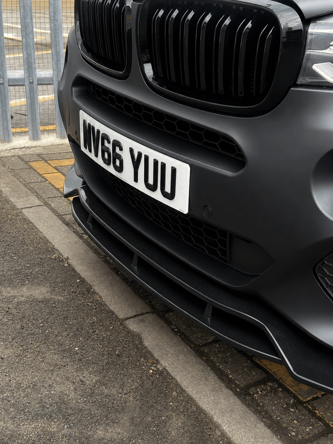 4D retro plate fitted, rear view