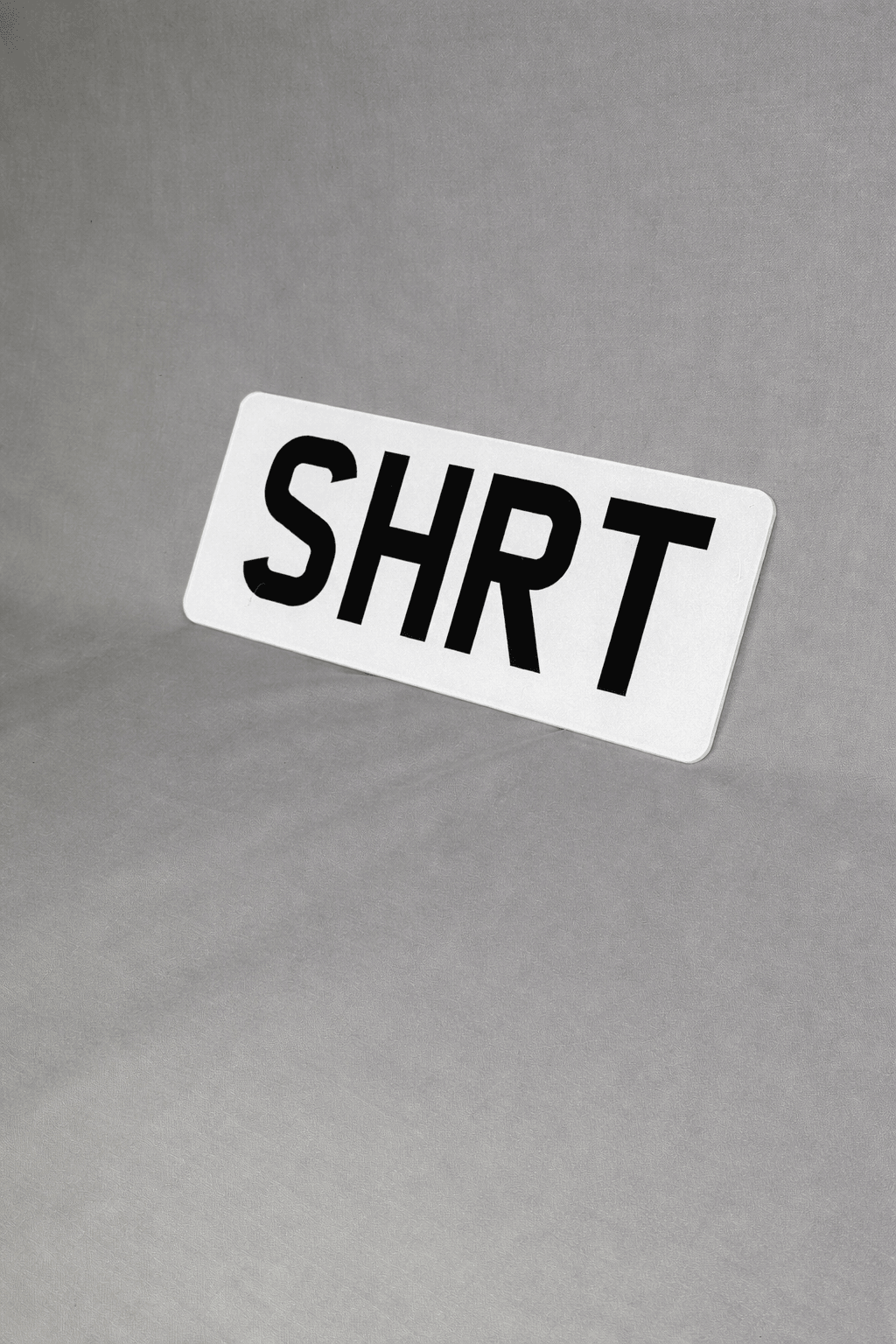 Short 280 x 111mm number plate with a 4-character registration
