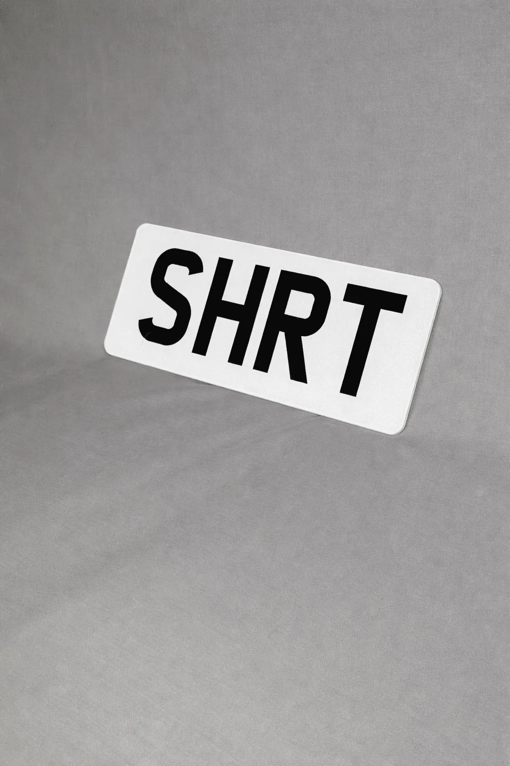 Short 280 x 111mm number plate with a 4-character registration
